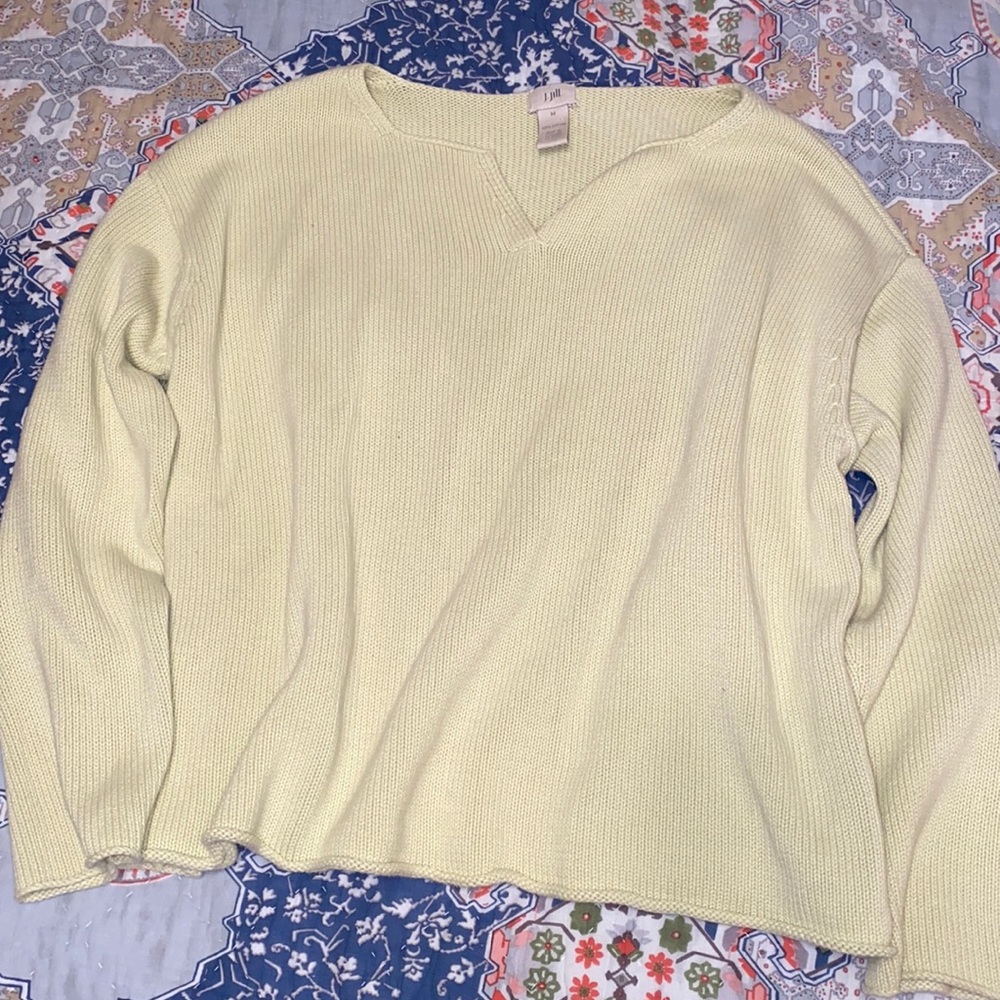 light green sweater